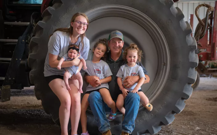 Moreland-farms-family-with-tractor